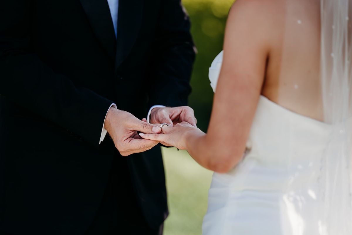Bride and Groom exchanging rings at wedding cerremony